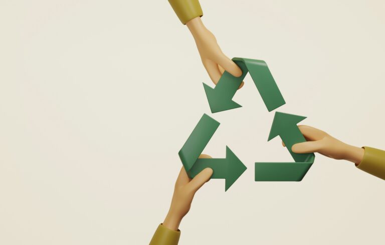 Three green arrows arranged in a circular pattern representing Environmental, Social and Governance (ESG) principles.