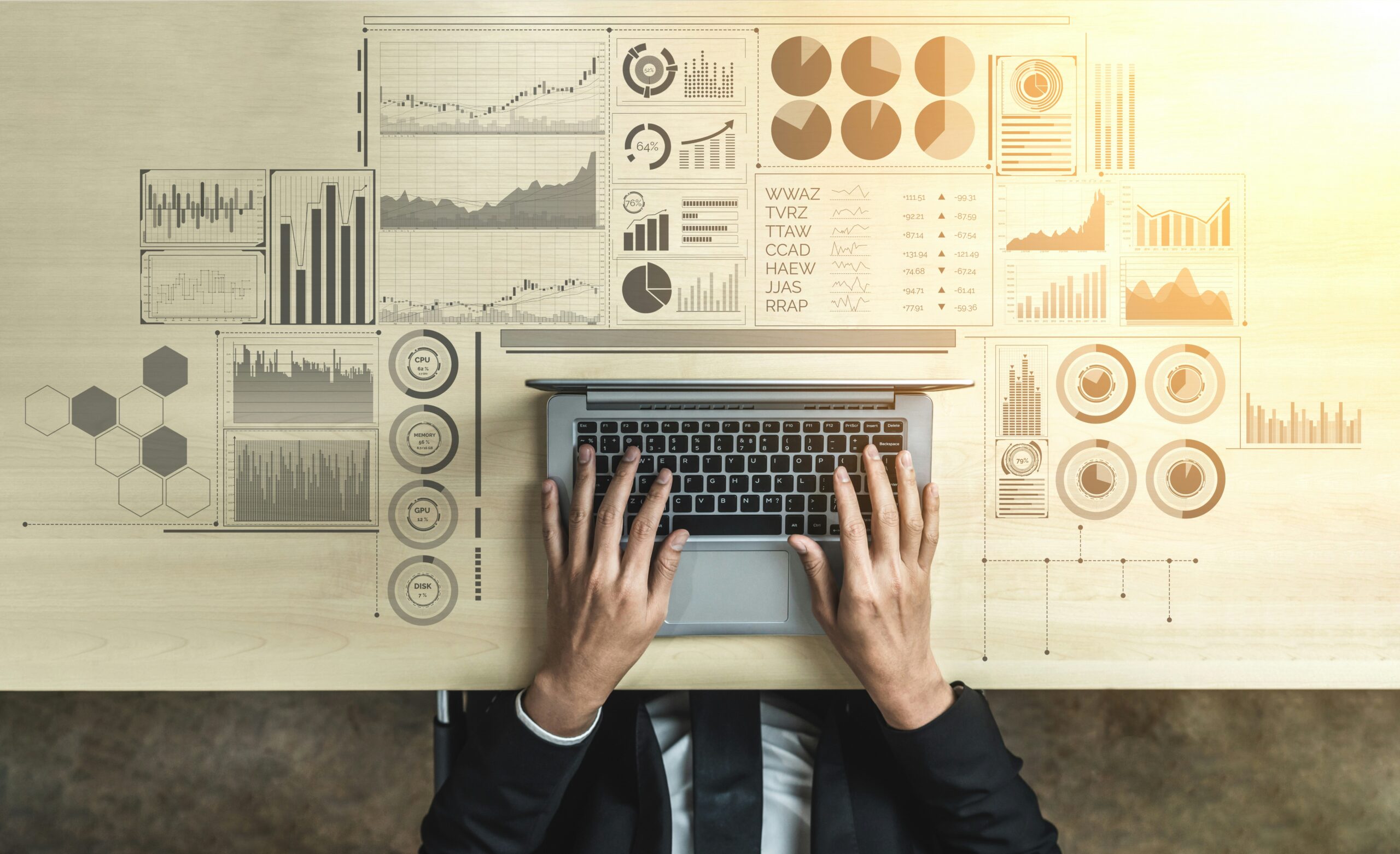 Desk with keyboard, financial charts and investment reports, illustrating a private markets fund launch and asset management.