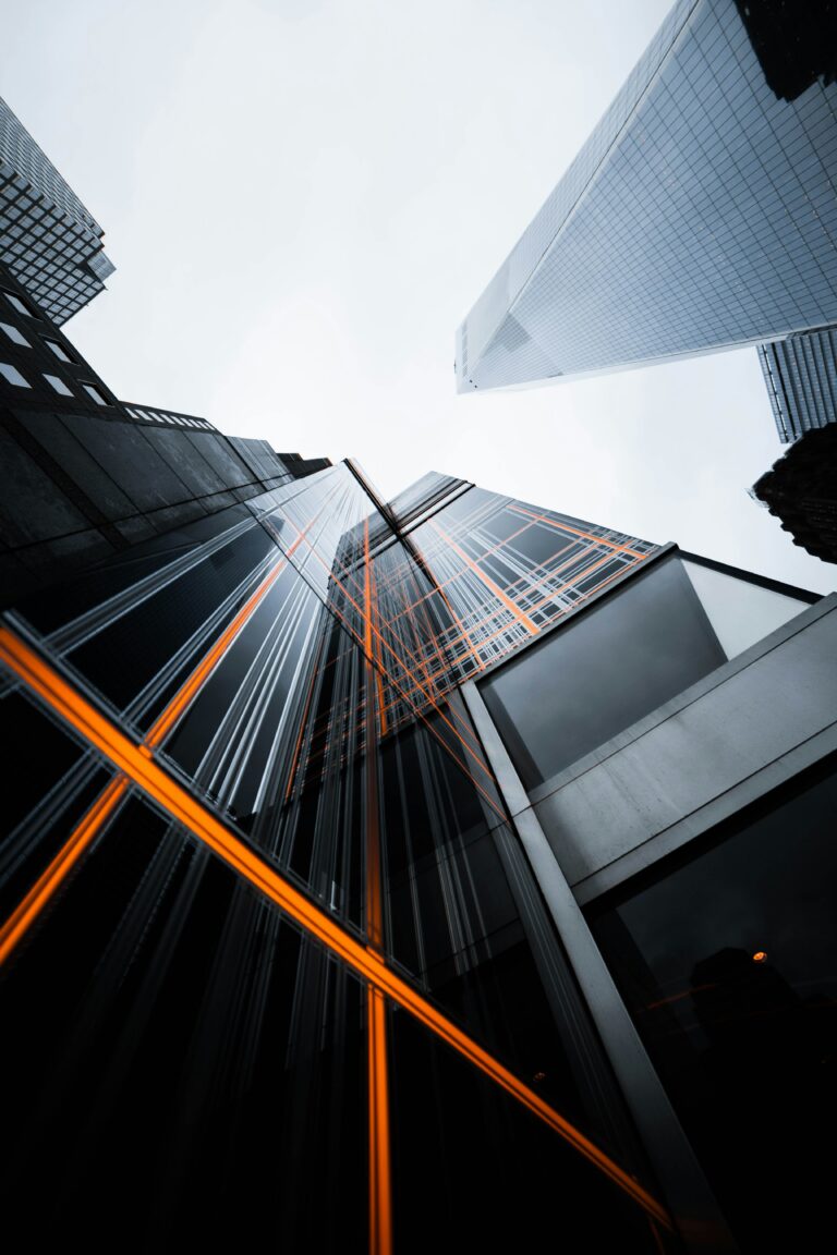 Modern financial district skyscrapers representing institutional investment growth and the launch of a new investment fund.
